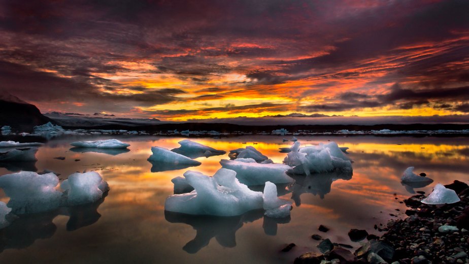 NEW! SLEEP IN A GLASS IGLOO FROZEN INTO A GLACIAL LAGOON ON A PRIVATE HOLIDAY IN ICELAND